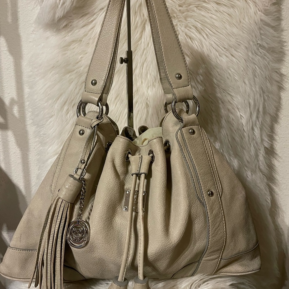 MCM  Medium drawstring leather bag. Cleaned and roomy.